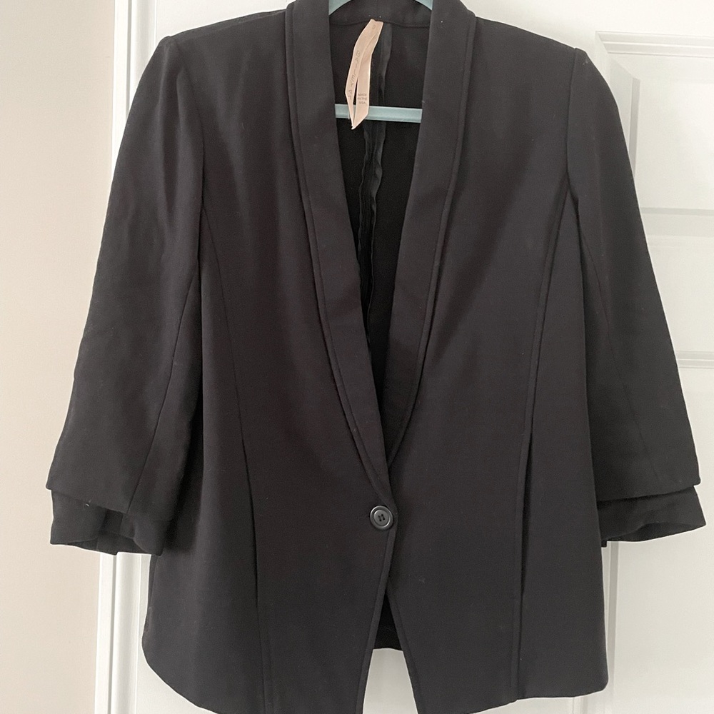 Woman’s black jacket